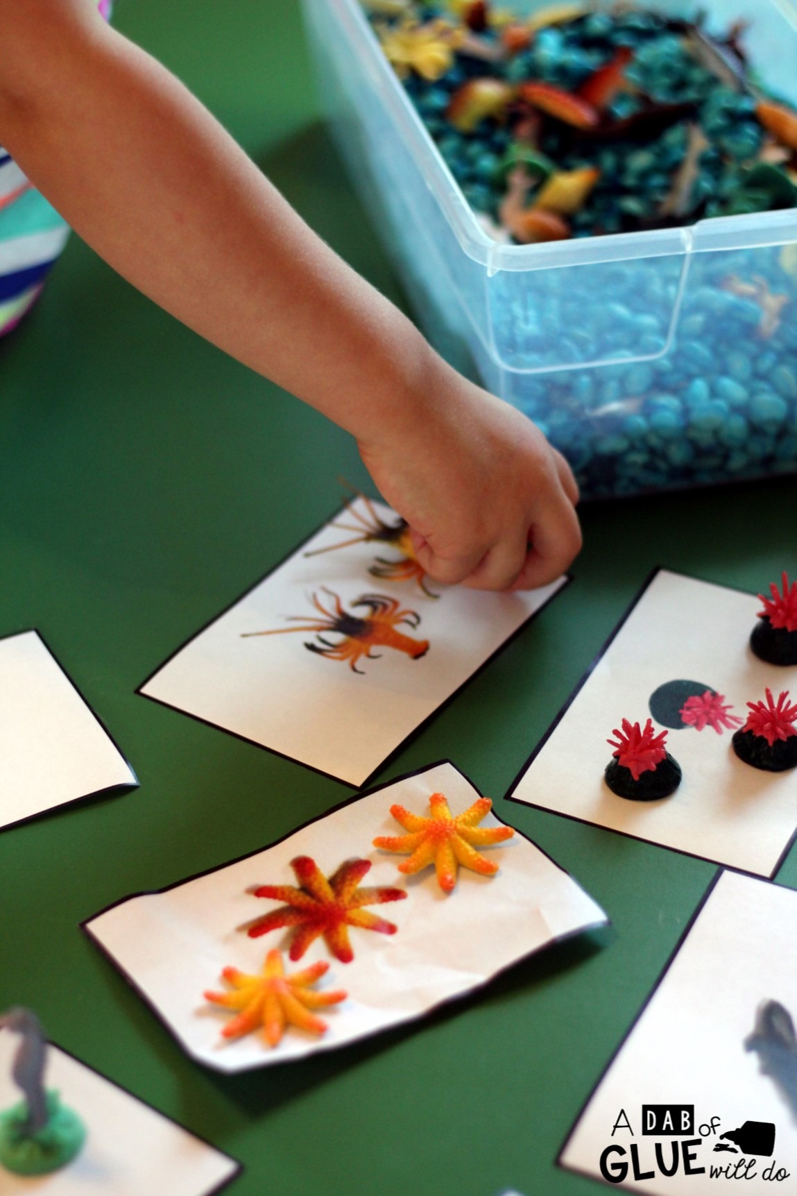 Ocean Sensory Bin Sorting is a perfect way to teach children about ocean animals and sorting in a fun and hands-on way. 