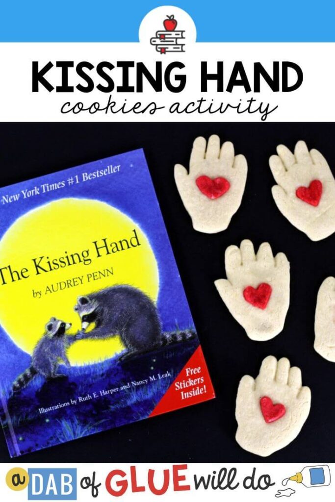 The Kissing Hand book with some hand and heart cookies next to it.