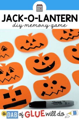 Pumpkin cut outs with jack-o-lantern faces drawn on them with sharpie