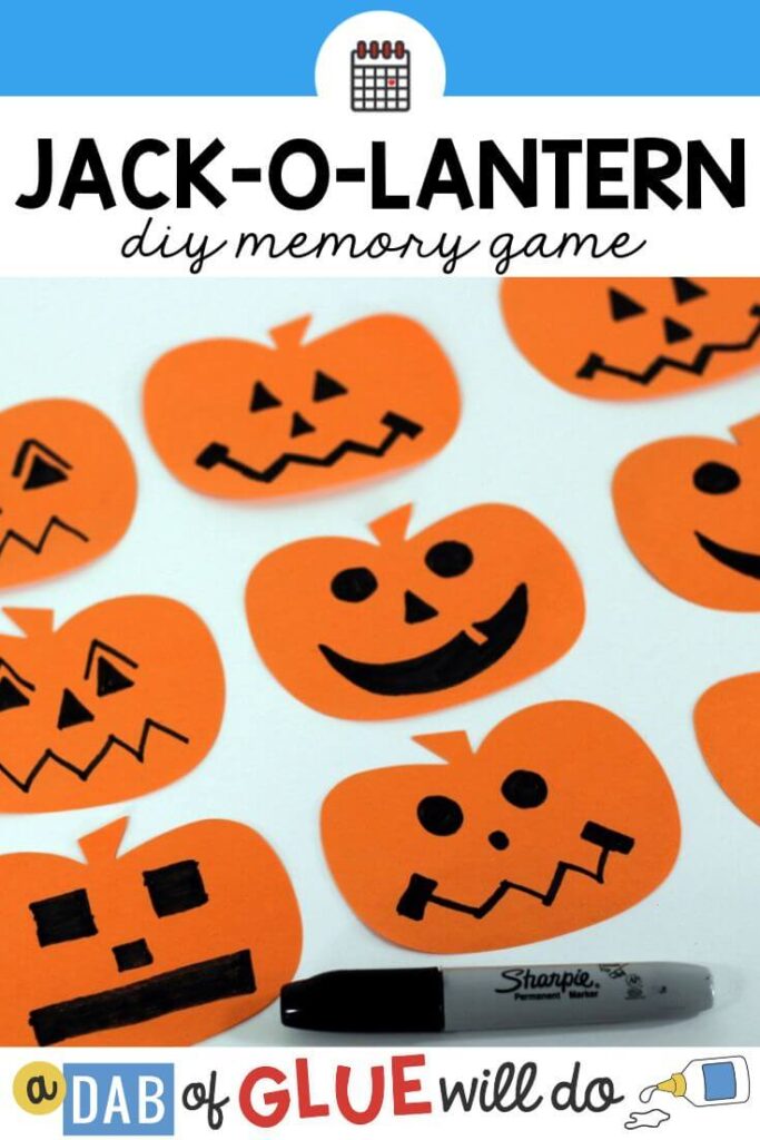 Pumpkin cut outs with jack-o-lantern faces drawn on them with sharpie
