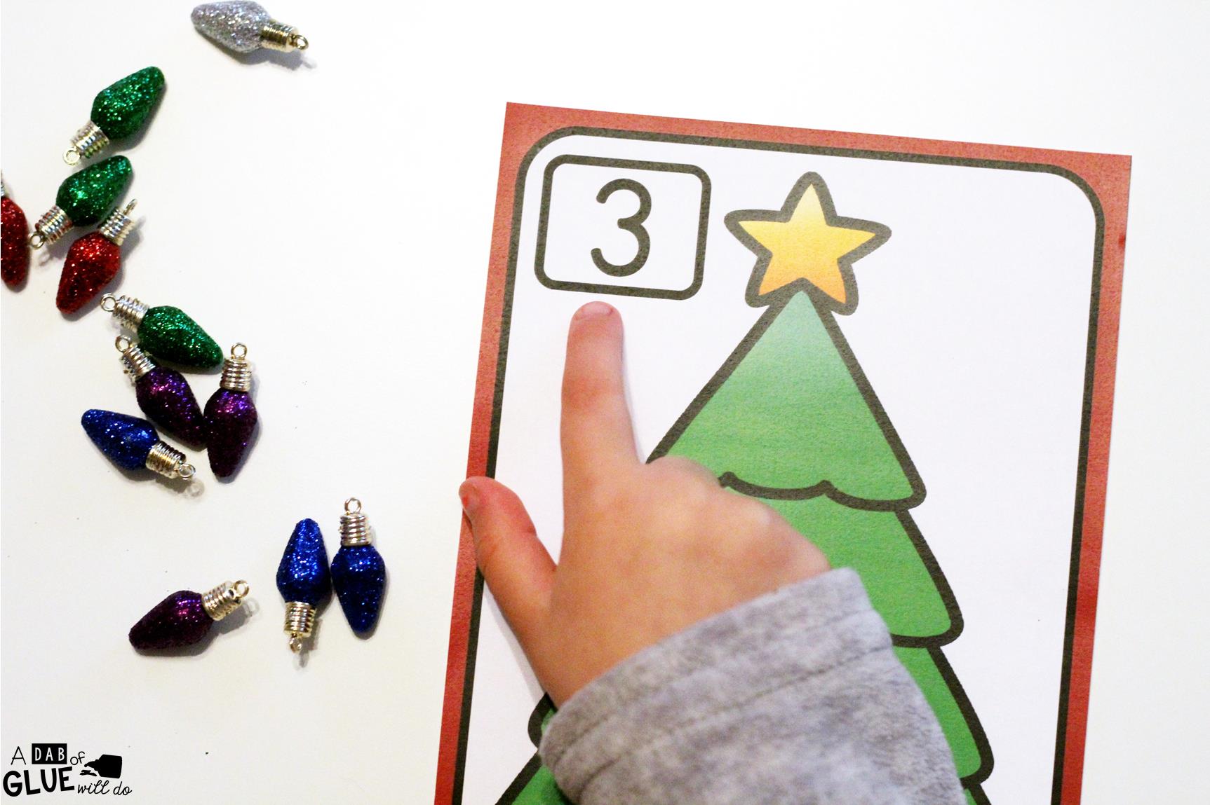 Christmas Tree Number Mats is the perfect addition to your math centers this holiday season.  This free printable is perfect for preschool, kindergarten, and first grade students. 
