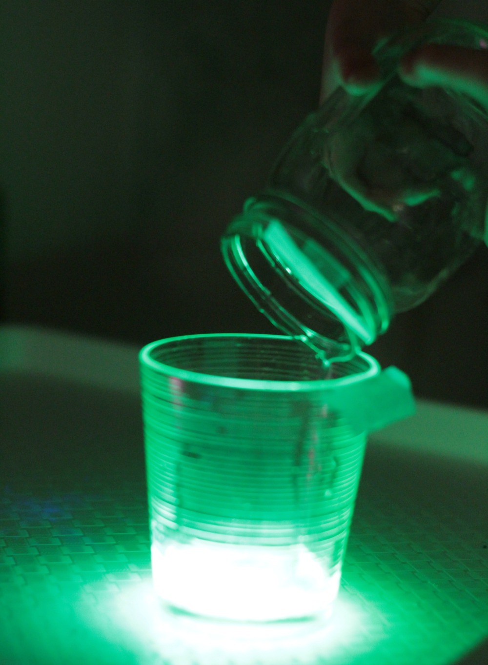 Kids can learn about the chemical properties of glow sticks and how they create glowing light in the glow stick science lab.