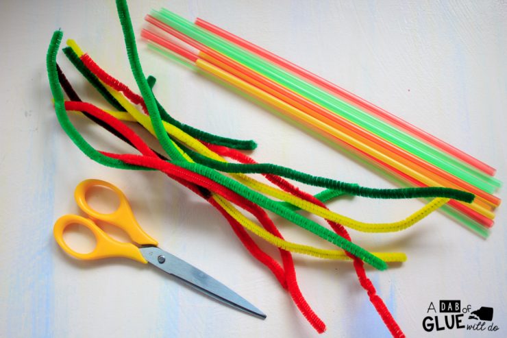 The Pipe Cleaner and Straw Apple craft is simple to make and great for practicing fine motor skills like cutting and lacing, early math & color recognition 