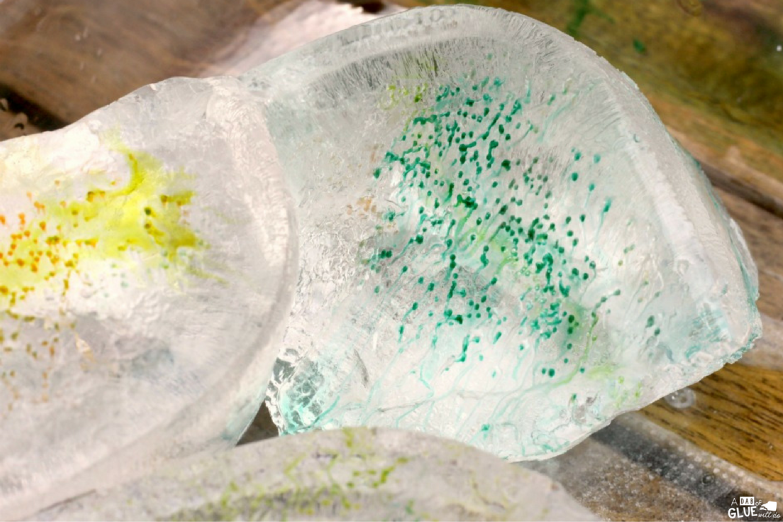 Once in awhile we find a science experiment that is just as much art as it is science. Kids in preschool and kindergarten particularly love these creative and colorful science experiments. Ice painting with salt and watercolors is the perfect balance of art of science and is all kinds of fun!