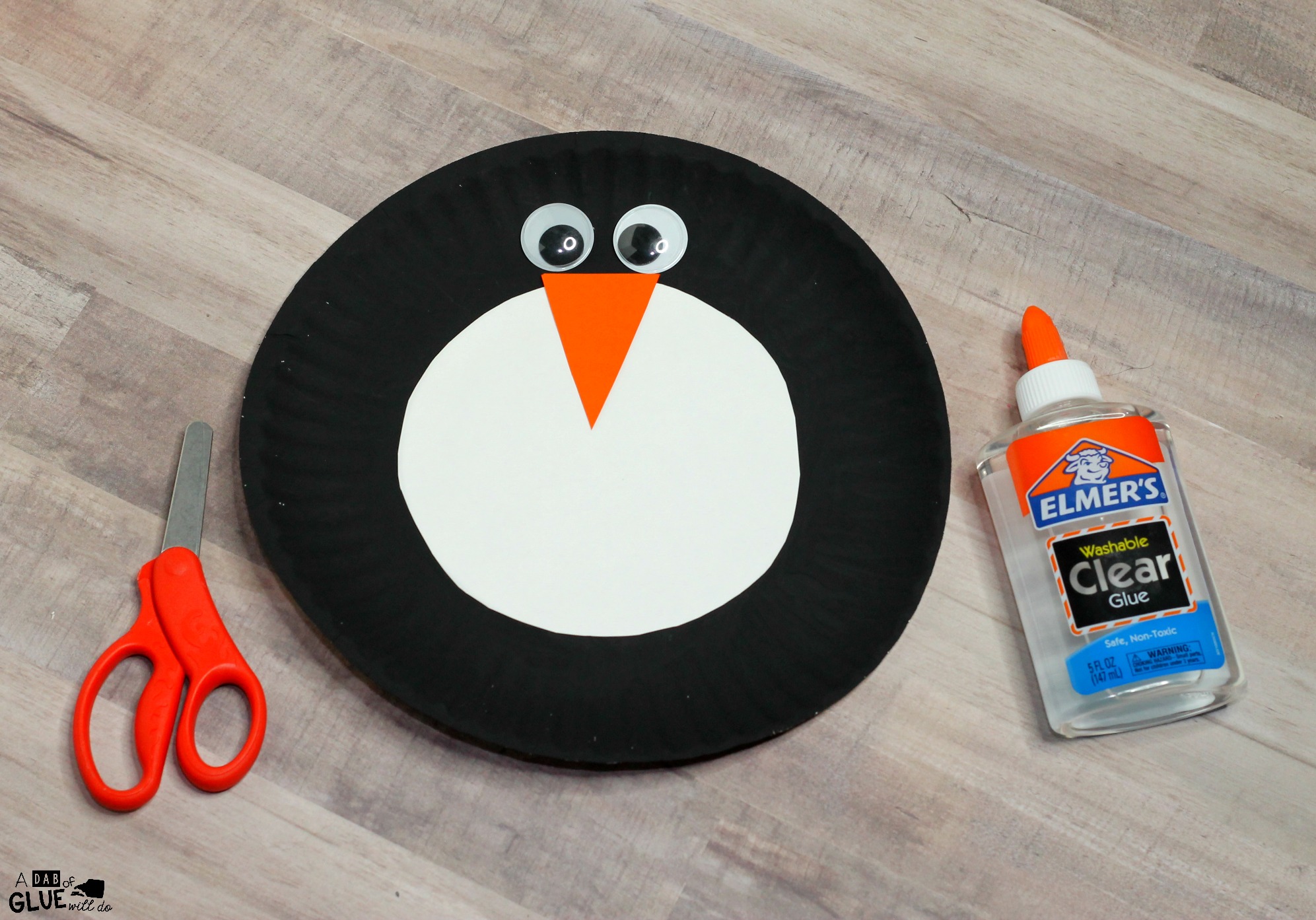 Add this Paper Plate Penguin Craft to your classroom winter crafts! It's perfect for winter habitat unit study or penguin animal study activities too.