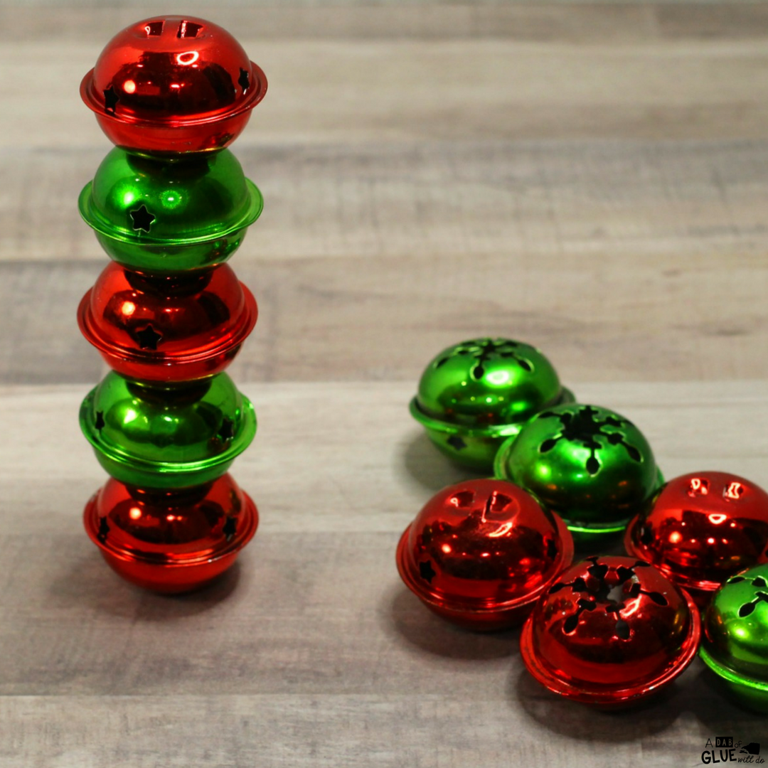 In this Jingle Bell Stacking STEM Activity, your students will problem solve as they try to create a tower of jingle bells. They will explore stability, surface area, gravity, and much more as they test different jingles bells and other materials.