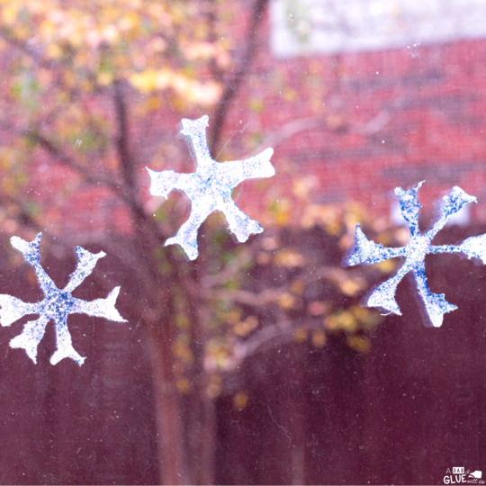 Your kindergarten students are going to LOVE making Snowflake Window Clings as your next winter craft! This is a great holiday kindergarten art project too!