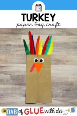 A turkey puppet made out of a paper bag and feathers.
