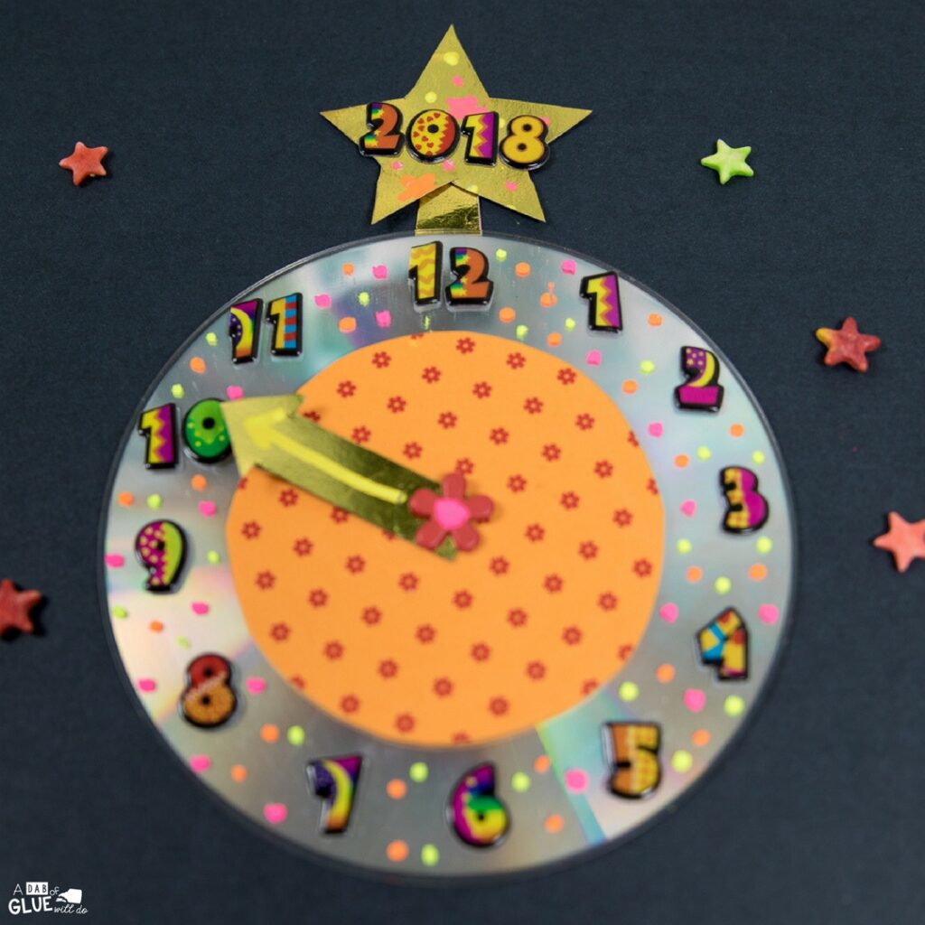 Celebrate the New Year with kids! Create this New Year's Eve Countdown Clock Craft with recycled materials for this winter craft. 