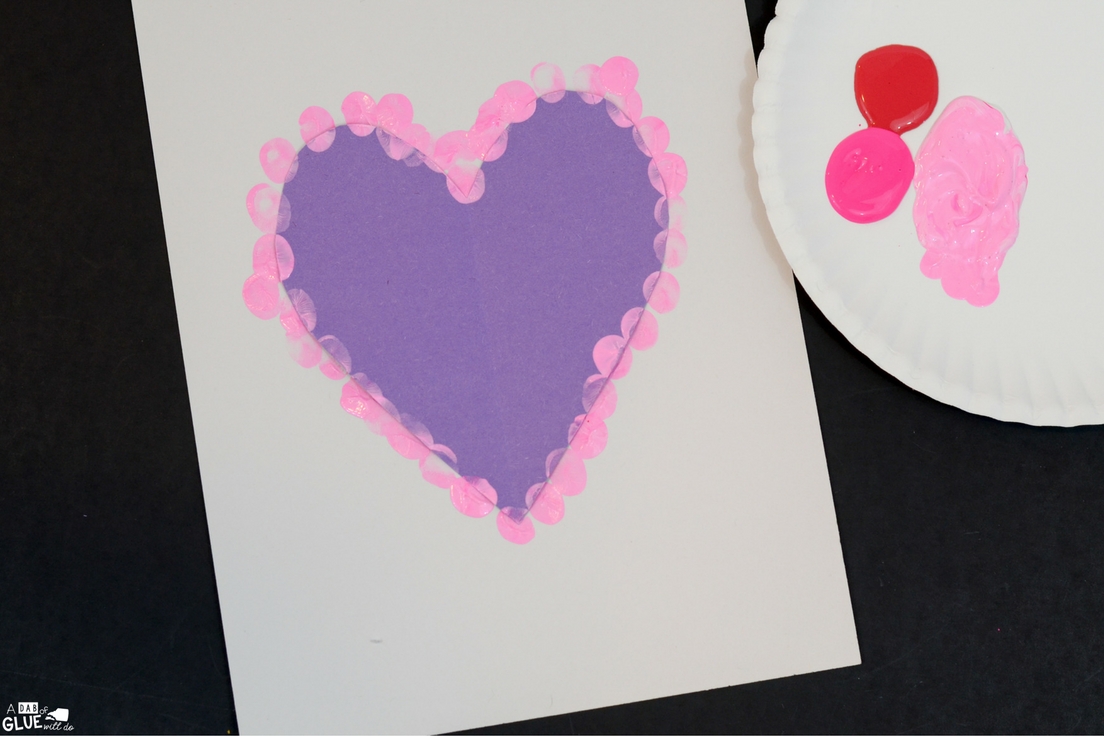 Create this Heart Thumbprint Art in your kindergarten classroom as your next Valentine's Day craft! It's a fine motor Valentine craft idea for kids.