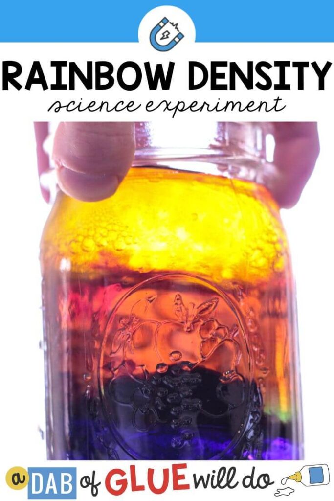 A jar with different colored liquids layered on each other
