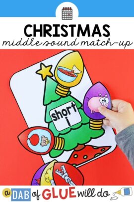 Christmas tree vowel mats with ornament picture cards to practice identifying middle sounds