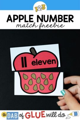 Two pieces of a paper apple puzzle with the number and word "eleven" on the top and 11 seeds on the bottom.