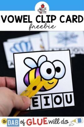 a card with a bee on it with the 5 vowels on the bottom and a yellow clothespin