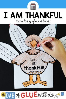 A paper turkey being colored in by a child with feathers that have what the child is thankful for written on them.