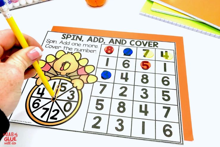 spin, add, and cover math games for kindergarten students with a Thanksgiving theme