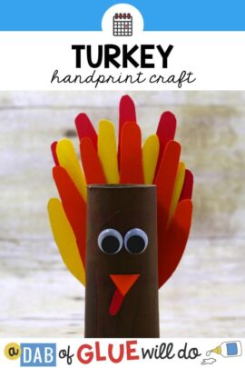 A toilet paper roll and handprint turkey craft